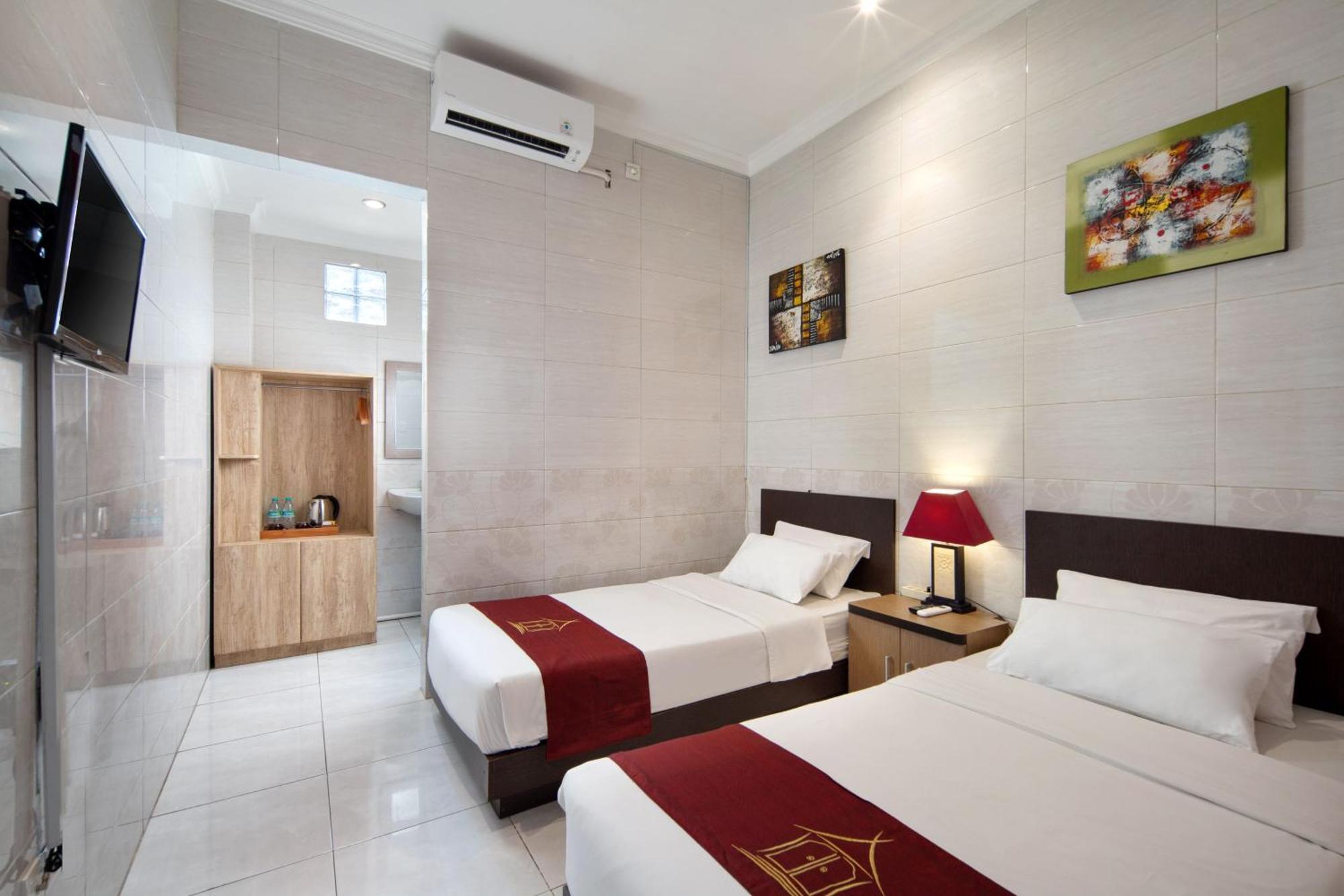 Angkul Angkul Beach Inn Kuta By Kamara Exterior photo