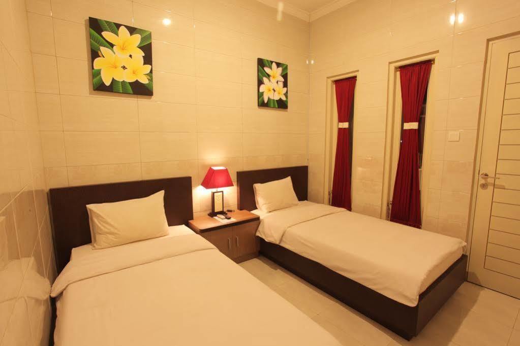 Angkul Angkul Beach Inn Kuta By Kamara Exterior photo